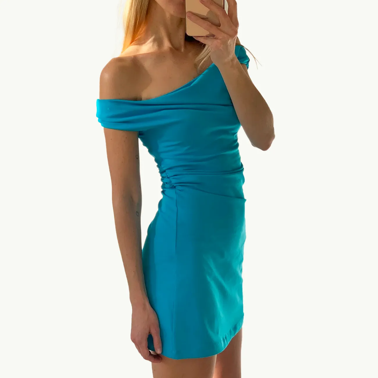 Stunning Turquoise Vera Mini Dress for a Fashion Statement